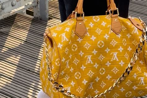 pharrell williams louis vuitton 1 million bag|pharrell williams money bag.